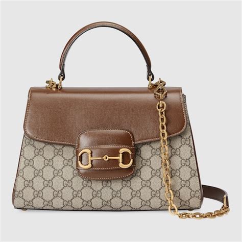 horsebit medium golden gucci|Gucci horse bit bag.